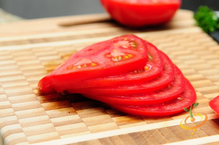 Red VR Moscow determinate tomato plant with ripe tomatoes on the vine, grown from SeedsNow seeds.